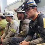 coal miners wait for the arrival