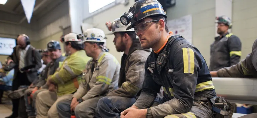 coal miners wait for the arrival