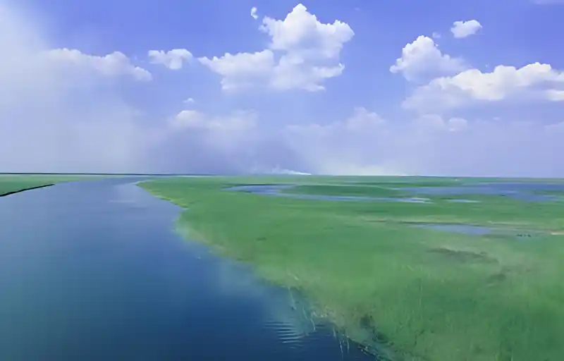 A view of the Luapula river and sky over the Luapula Bridge, the site for the Kasomeno-Mwenda project