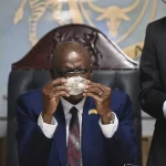 Botswana's President Mokgweetsi Masisi holds the 2,492-carat diamond that was unearthed at one of its mines and will be put on show, on Thursday, Aug. 22, 2024, in Gaborone. AP/AP