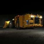 Caterpillar R1700 XE electric underground loader in mine drift