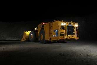 Caterpillar R1700 XE electric underground loader in mine drift