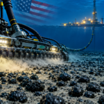 Deep-sea mining equipment collecting polymetallic nodules from the Pacific Ocean floor